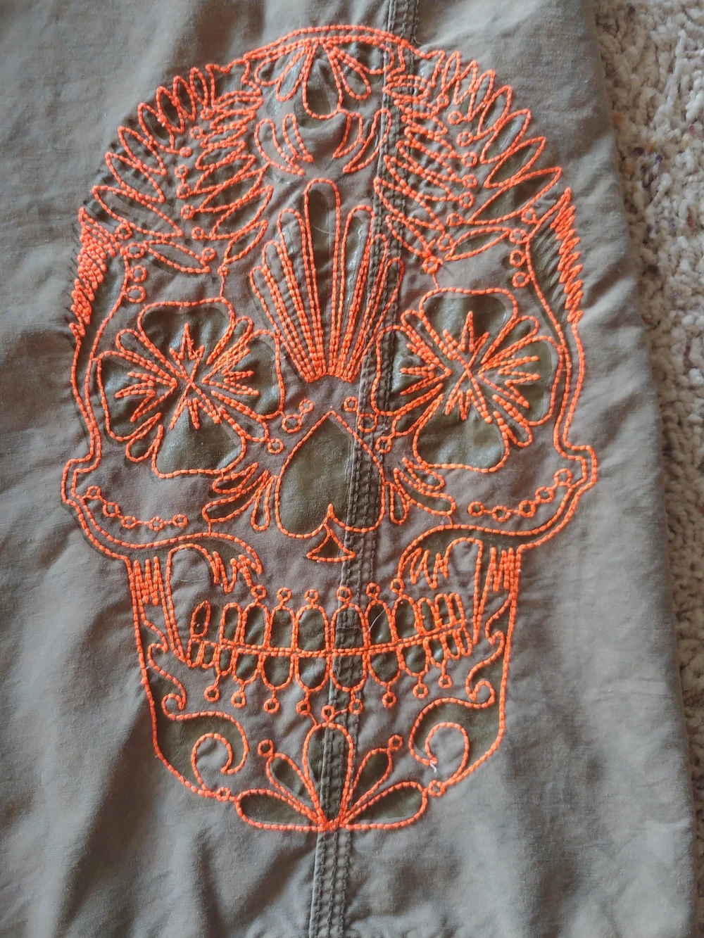 Old Navy Tan Hybrid Shorts with Orange Skull Accent
